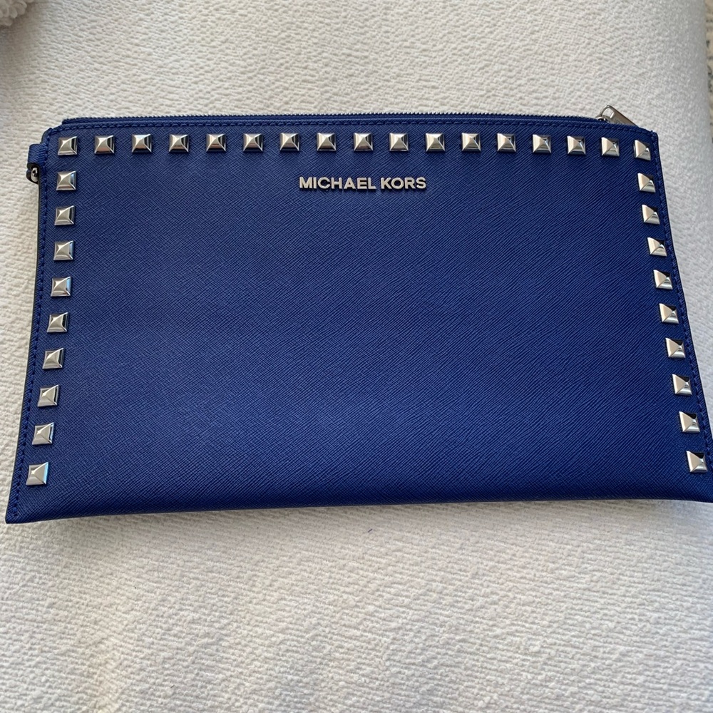 Michael Kors blue leather with silver spikes wrist clutch